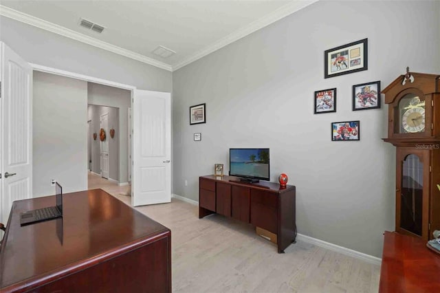 office space with crown molding and light hardwood / wood-style flooring