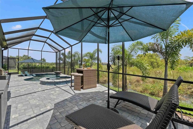 view of patio featuring a pool with hot tub and glass enclosure