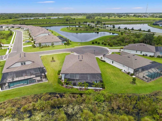 drone / aerial view featuring a water view