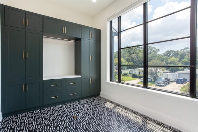 unfurnished bedroom featuring baseboards