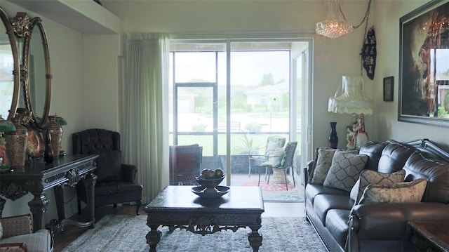 living room featuring a notable chandelier