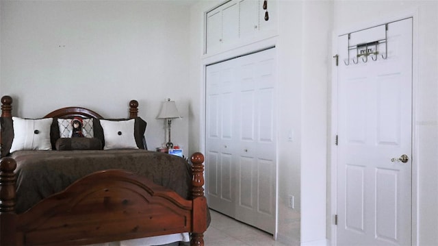 bedroom featuring light tile patterned floors