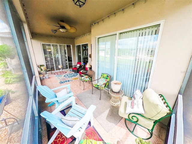 view of patio with ceiling fan