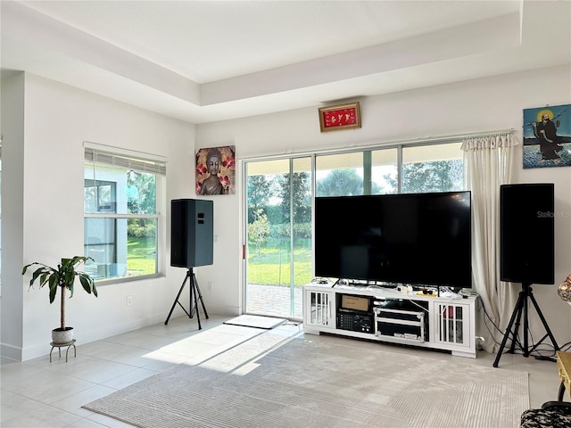 living room featuring tile patterned flooring and baseboards