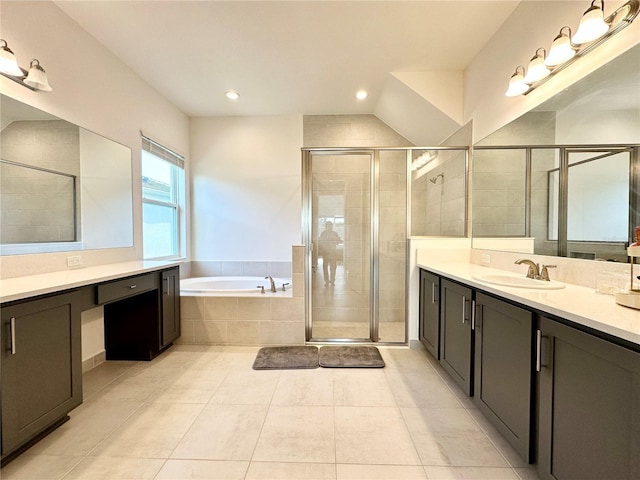 bathroom featuring a stall shower, tile patterned floors, vanity, a bath, and recessed lighting