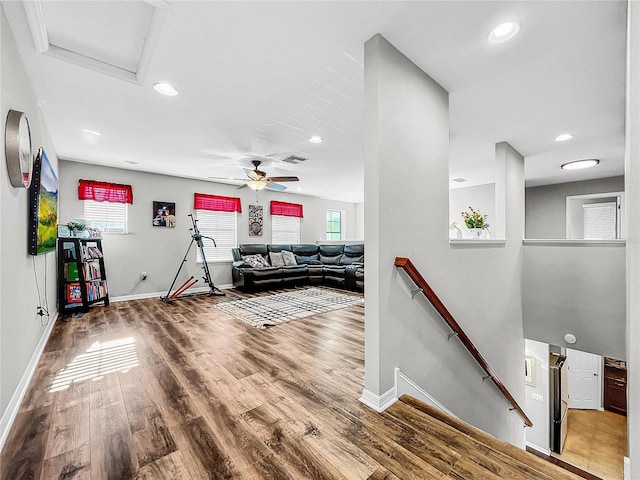 recreation room featuring hardwood / wood-style floors and ceiling fan