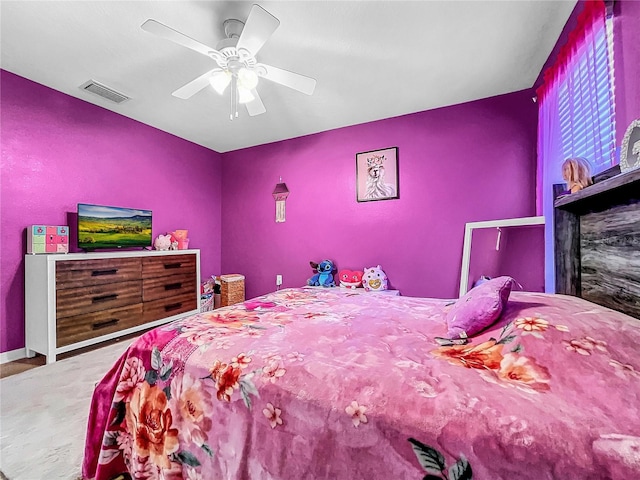 carpeted bedroom with ceiling fan