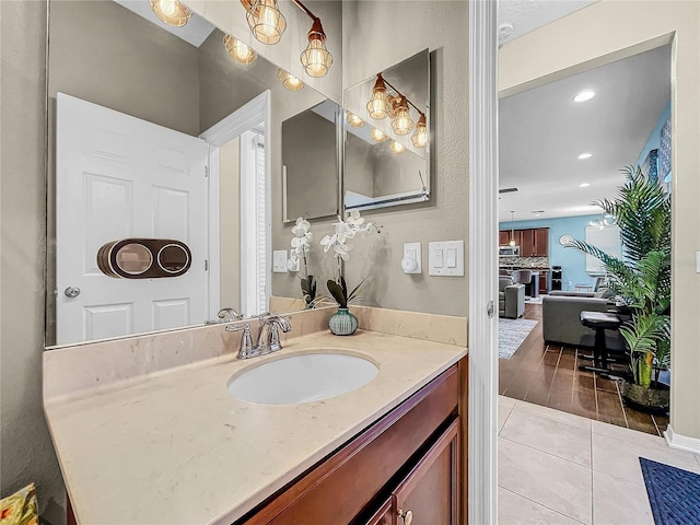 bathroom with wood-type flooring and vanity