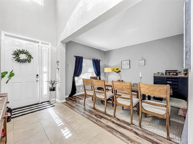 foyer featuring light tile patterned floors