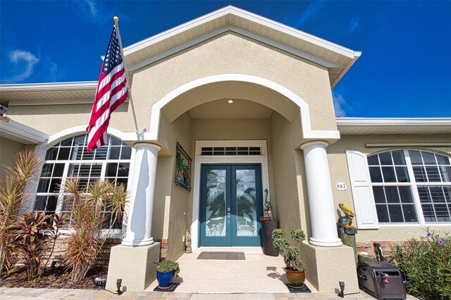 doorway to property with french doors