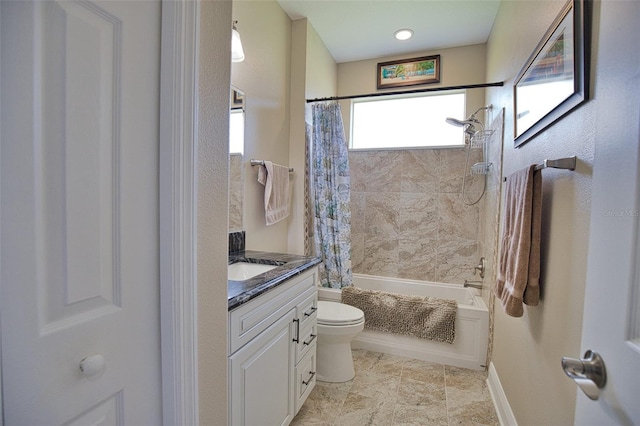 full bath featuring toilet, shower / tub combo, and vanity