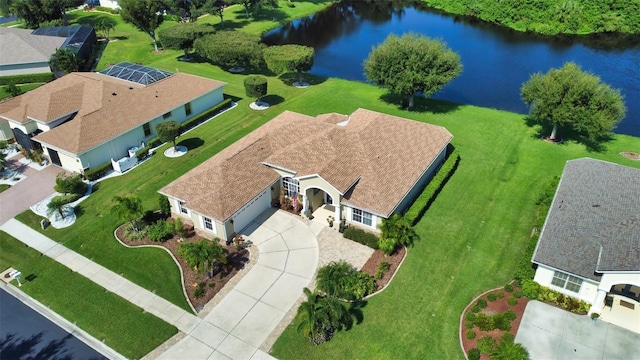 drone / aerial view with a water view