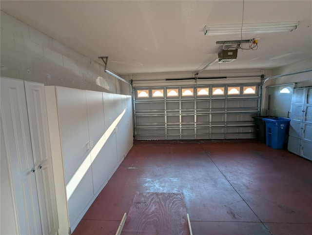 garage featuring a garage door opener