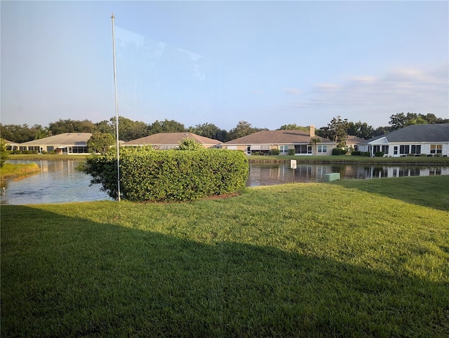 view of yard featuring a water view