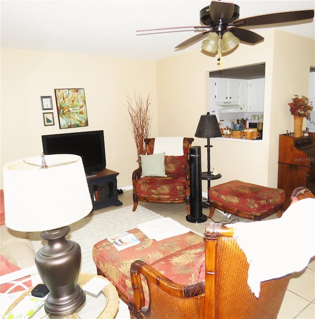 living room with light tile patterned flooring and ceiling fan