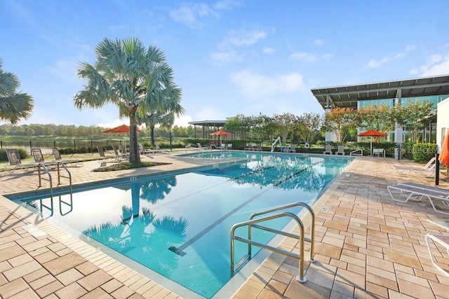 view of swimming pool featuring a patio