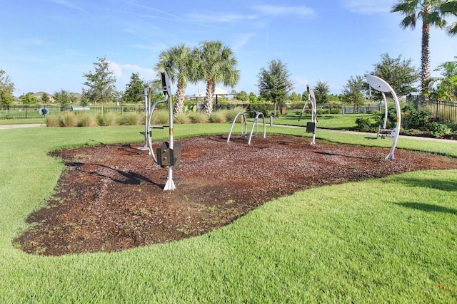 view of jungle gym with a lawn