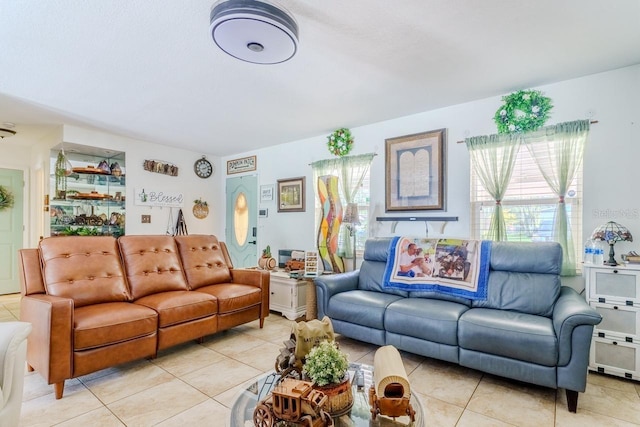 living area featuring light tile patterned flooring