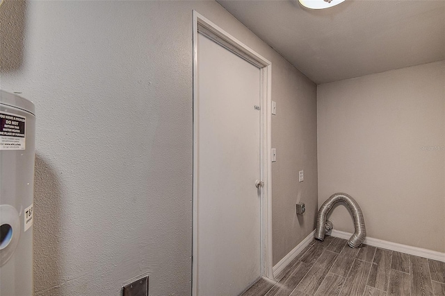 laundry room with dark hardwood / wood-style flooring