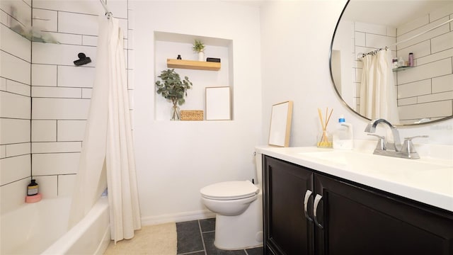 bathroom featuring shower / bathtub combination with curtain, toilet, vanity, baseboards, and tile patterned floors