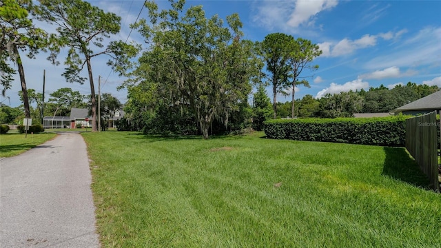 view of yard with fence