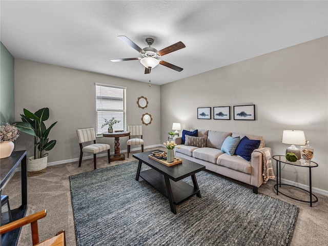 carpeted living room featuring ceiling fan