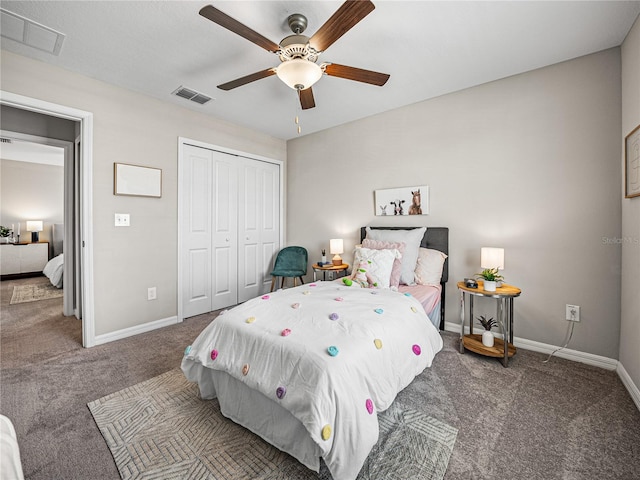 bedroom with carpet flooring, ceiling fan, and a closet