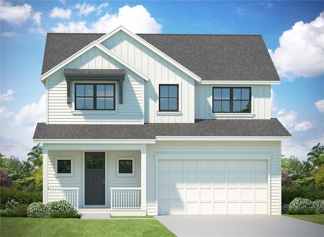 view of front of house featuring a garage and a front yard