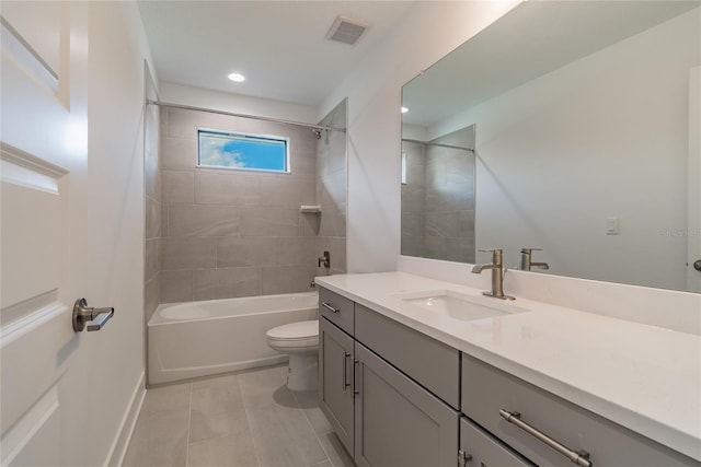full bathroom featuring washtub / shower combination, tile patterned flooring, vanity, toilet, and visible vents