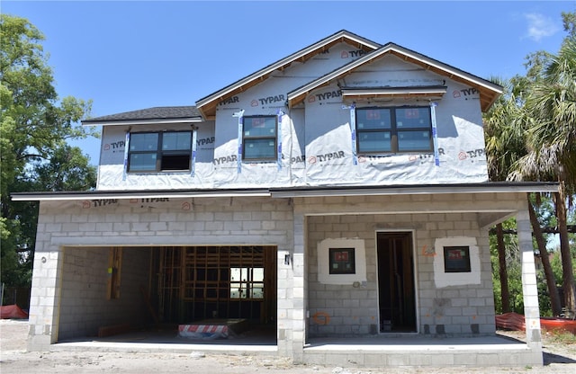 property under construction featuring an attached garage
