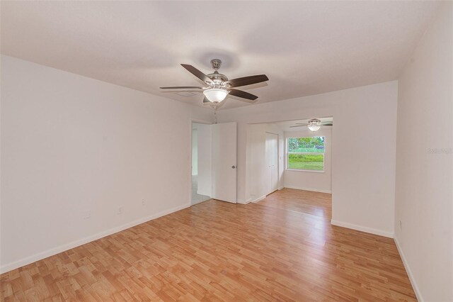 unfurnished room with light hardwood / wood-style floors and ceiling fan