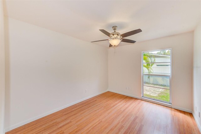 unfurnished room with ceiling fan and light hardwood / wood-style floors