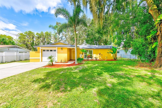 ranch-style home with a garage and a front lawn