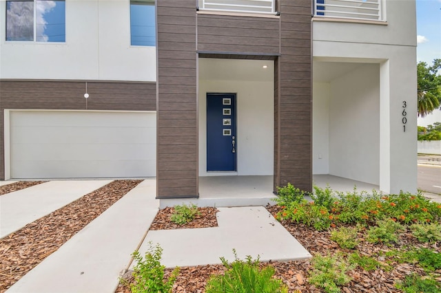 entrance to property featuring a garage