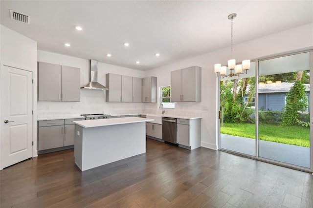 210 E Janette Ave, Tampa, FL 33603 - kitchen featuring visible vents, dishwasher, wall chimney exhaust hood, light countertops, and gray cabinetry