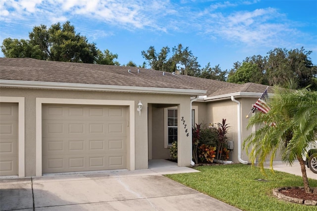 ranch-style home featuring a garage