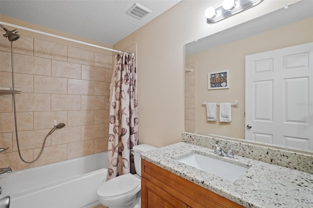 full bathroom with a textured ceiling, toilet, vanity, and shower / bath combo