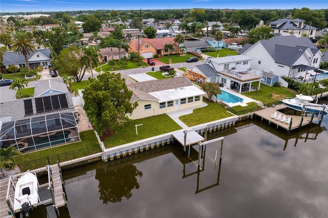 aerial view featuring a water view and a residential view