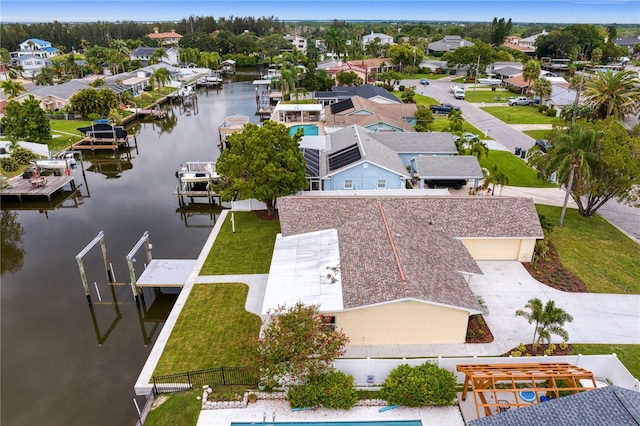 bird's eye view with a water view