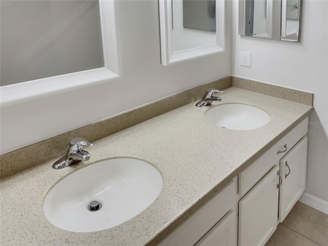 bathroom featuring dual vanity and tile patterned floors