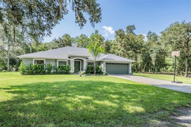 single story home with a garage and a front yard