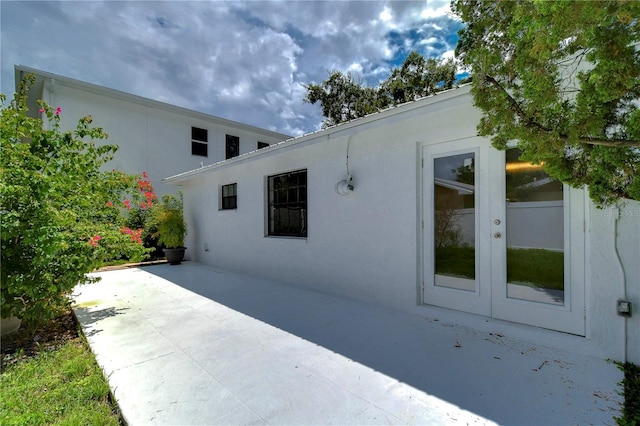 view of home's exterior featuring a patio area and stucco siding