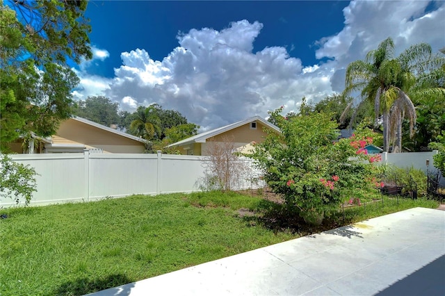 view of yard featuring a fenced backyard and a patio