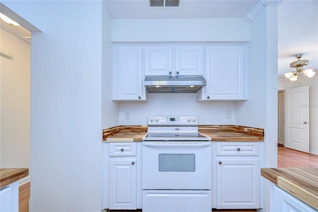 kitchen featuring visible vents, electric stove, white cabinetry, and under cabinet range hood