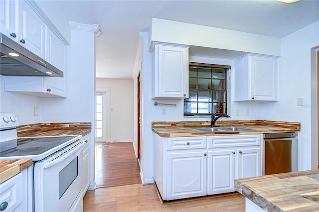 kitchen featuring under cabinet range hood, white electric range, butcher block countertops, a sink, and white cabinets