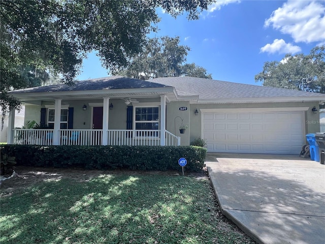 single story home featuring roof with shingles, stucco siding, covered porch, concrete driveway, and an attached garage