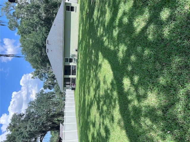 exterior space featuring a front yard