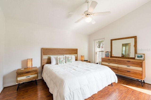 bedroom featuring lofted ceiling, a ceiling fan, baseboards, and wood finished floors