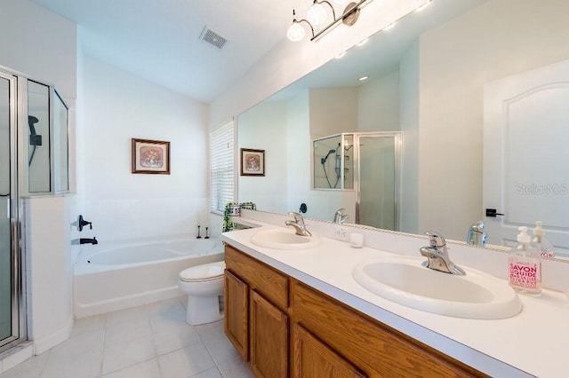 bathroom with visible vents, a sink, a shower stall, and tile patterned floors