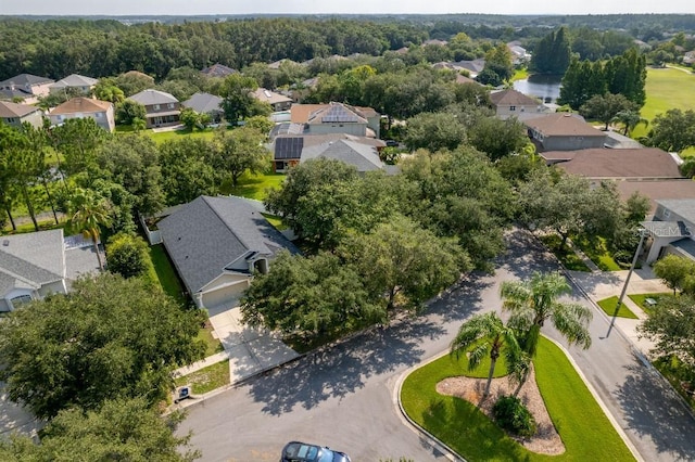 aerial view featuring a residential view and a view of trees